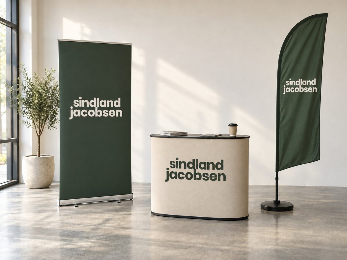 Rollup, messedisk og beachflagg i mosegrønt